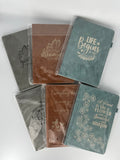 Laser engraved faux leather journals with inspirational quotes in gray and brown